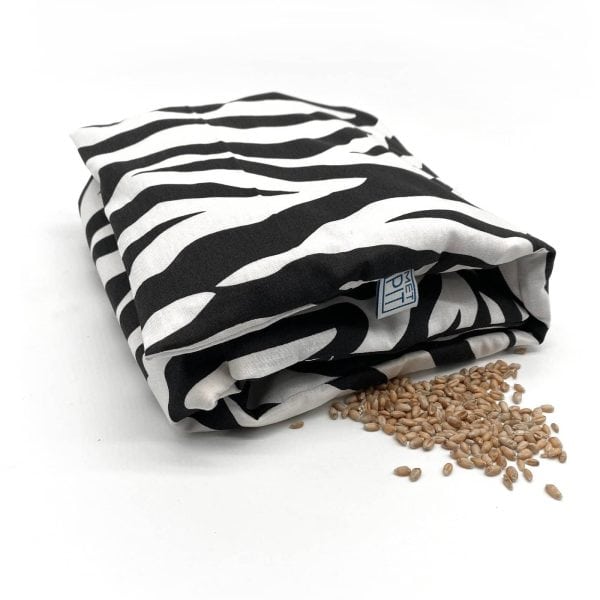 Zebra print pittenzak tarwe warmtekussen gevouwen